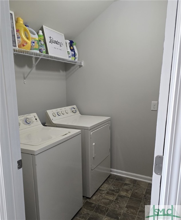 12 Noble Jones Ct, Port Wentworth, GA 31407 - washroom with separate washer and dryer, laundry area, stone finish flooring, and baseboards