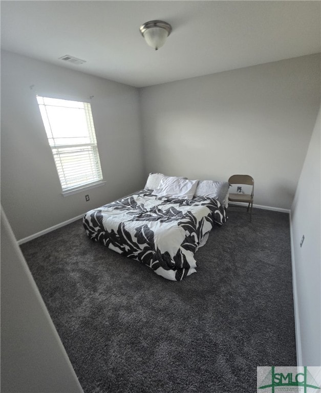 12 Noble Jones Ct, Port Wentworth, GA 31407 - bedroom featuring carpet floors, baseboards, and visible vents