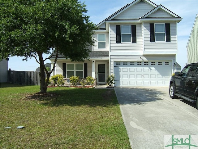 12 Noble Jones Ct, Port Wentworth, GA 31407 - traditional home with fence, an attached garage, driveway, and a front yard