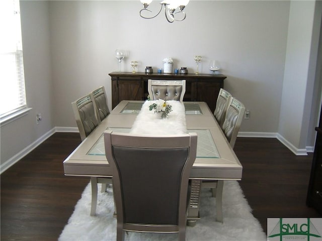 12 Noble Jones Ct, Port Wentworth, GA 31407 - dining area with an inviting chandelier, baseboards, and wood finished floors