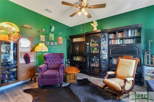 53 Boykin Way NE, Ludowici, GA 31316 - sitting room featuring vaulted ceiling, a ceiling fan, and wood finished floors