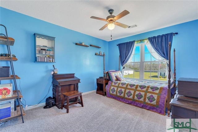 53 Boykin Way NE, Ludowici, GA 31316 - bedroom with baseboards, visible vents, ceiling fan, and carpet