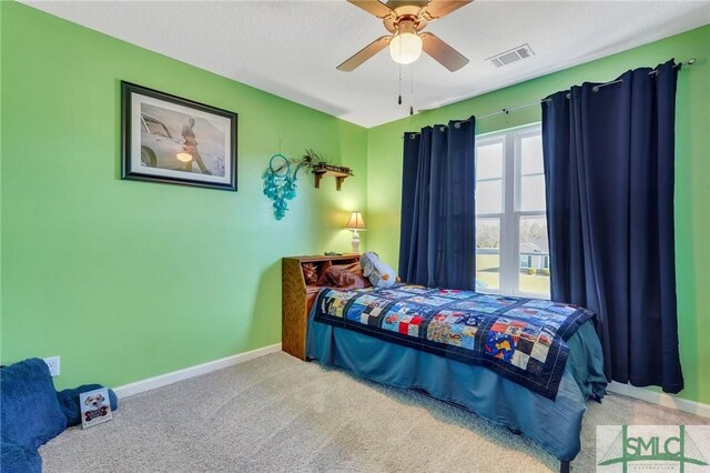 53 Boykin Way NE, Ludowici, GA 31316 - carpeted bedroom with baseboards, ceiling fan, and visible vents