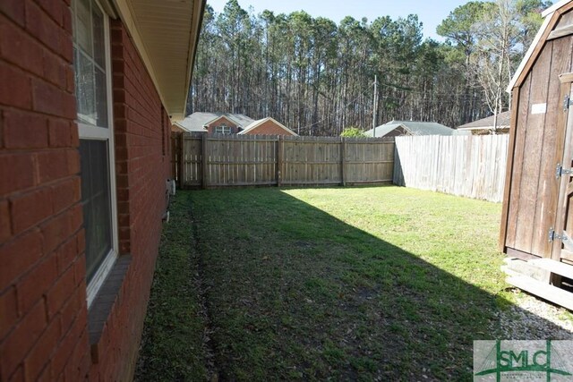 350 Clark St, Richmond Hill, GA 31324 - view of yard featuring a fenced backyard