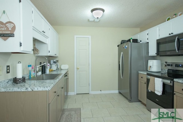 350 Clark St, Richmond Hill, GA 31324 - kitchen featuring visible vents, white cabinetry, a textured ceiling, and stainless steel appliances