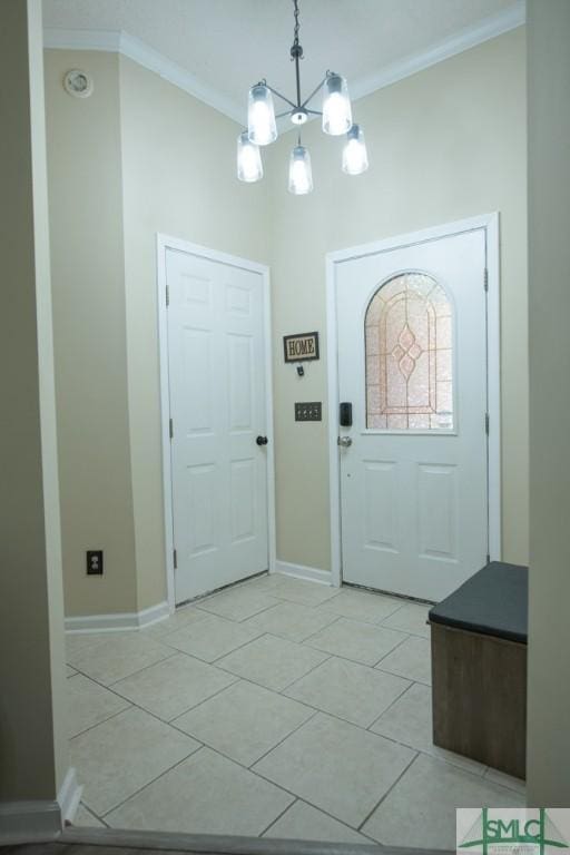 350 Clark St, Richmond Hill, GA 31324 - foyer featuring light tile patterned floors, baseboards, a chandelier, and crown molding