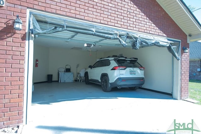 350 Clark St, Richmond Hill, GA 31324 - view of vehicle parking with a garage