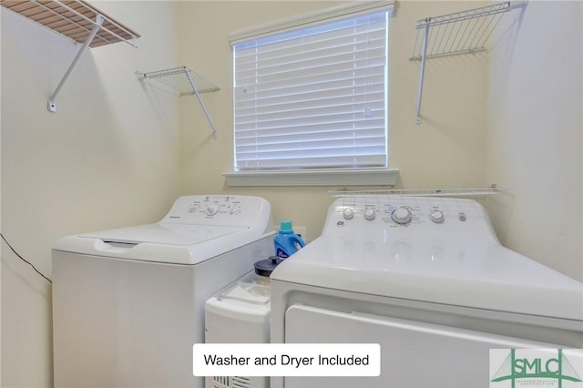 laundry area featuring independent washer and dryer and laundry area
