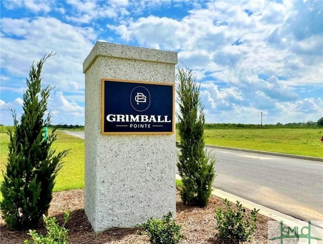 view of community sign