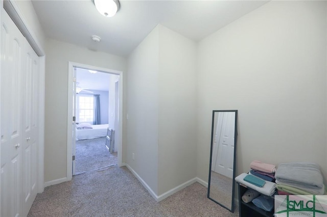 30 Walker Ct, Richmond Hill, GA 31324 - hallway with baseboards and carpet flooring