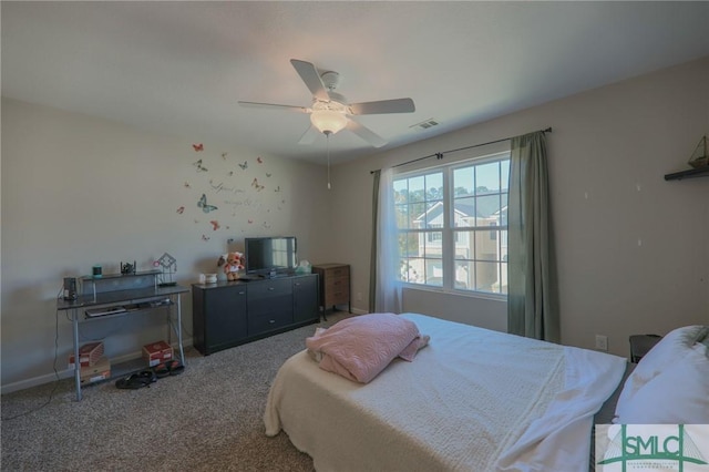 30 Walker Ct, Richmond Hill, GA 31324 - carpeted bedroom featuring a ceiling fan, baseboards, and visible vents