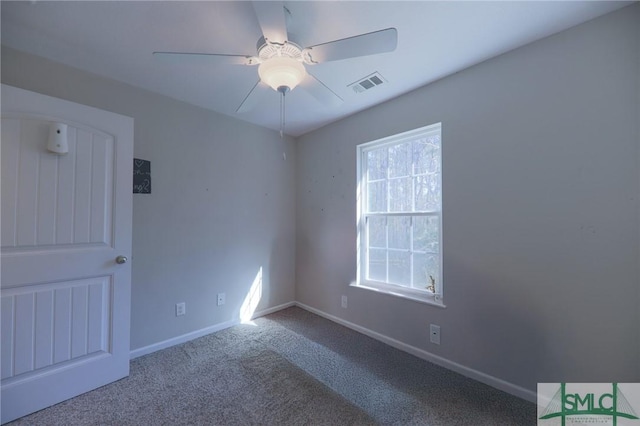 30 Walker Ct, Richmond Hill, GA 31324 - carpeted empty room with baseboards, visible vents, and a ceiling fan