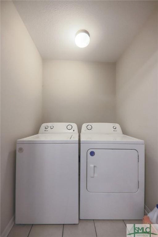 30 Walker Ct, Richmond Hill, GA 31324 - washroom with laundry area, separate washer and dryer, and light tile patterned flooring