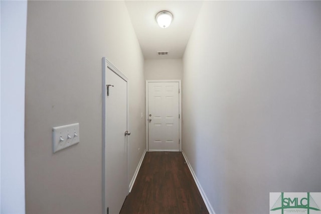 30 Walker Ct, Richmond Hill, GA 31324 - hallway with baseboards, visible vents, and dark wood-type flooring