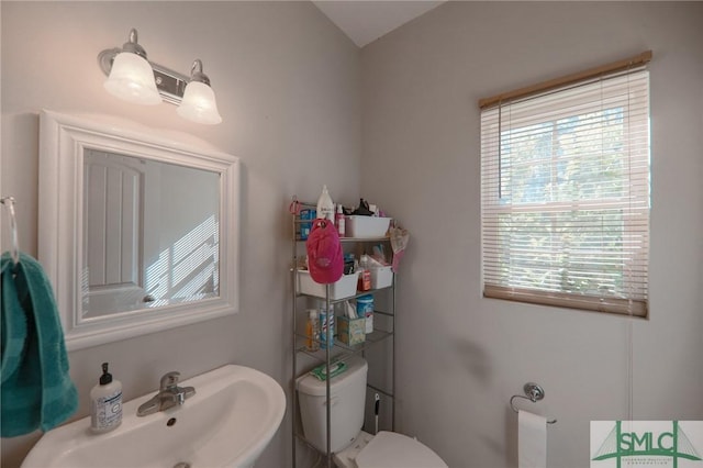 30 Walker Ct, Richmond Hill, GA 31324 - bathroom with toilet and a sink