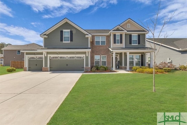 52 Shoefstall St, Port Wentworth, GA 31407 - craftsman-style house with fence, a garage, concrete driveway, a front yard, and brick siding