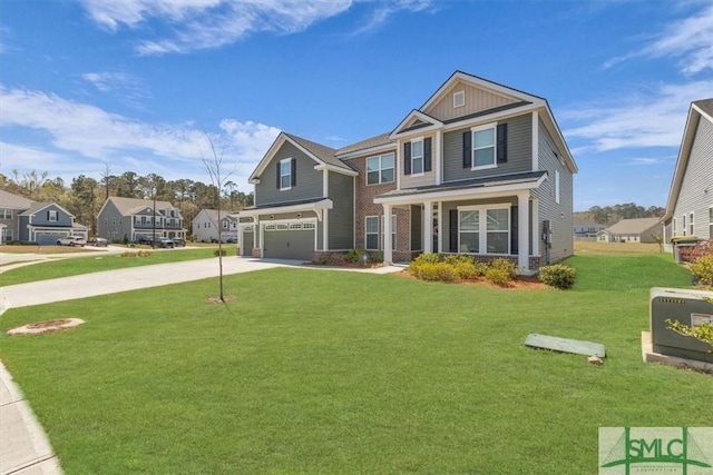 52 Shoefstall St, Port Wentworth, GA 31407 - craftsman house featuring a front lawn, driveway, and an attached garage