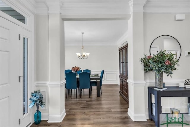 52 Shoefstall St, Port Wentworth, GA 31407 - foyer with a decorative wall, ornamental molding, a chandelier, and wood finished floors