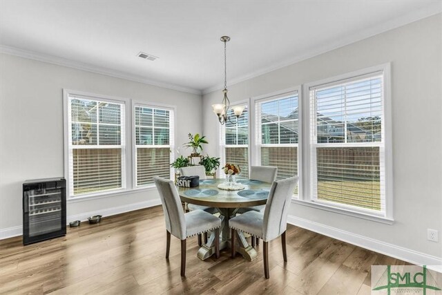 52 Shoefstall St, Port Wentworth, GA 31407 - dining space featuring baseboards, visible vents, plenty of natural light, and wood finished floors
