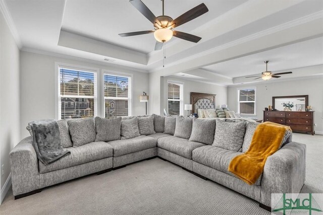 52 Shoefstall St, Port Wentworth, GA 31407 - living room with a tray ceiling, ornamental molding, a ceiling fan, and light colored carpet