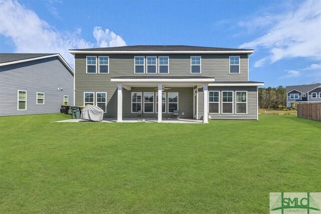 52 Shoefstall St, Port Wentworth, GA 31407 - rear view of house with a ceiling fan, a yard, and a patio area