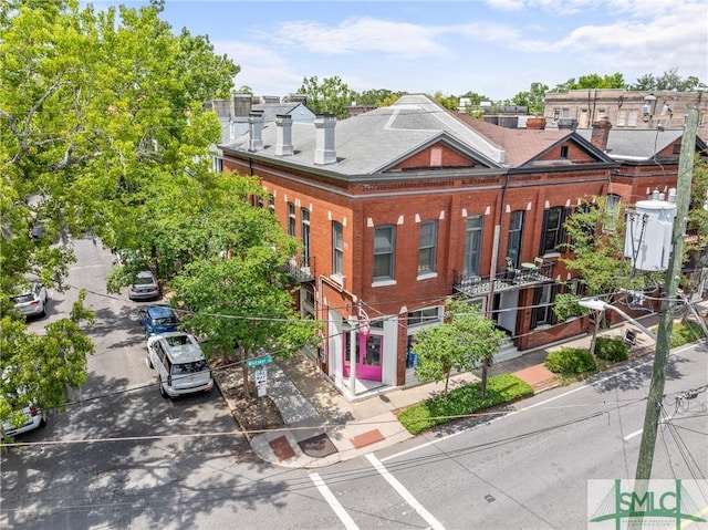 417 Whitaker St, Savannah, GA 31401 - view of building exterior featuring uncovered parking