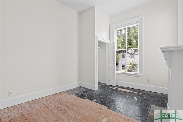 417 Whitaker St, Savannah, GA 31401 - spare room featuring hardwood / wood-style flooring and baseboards