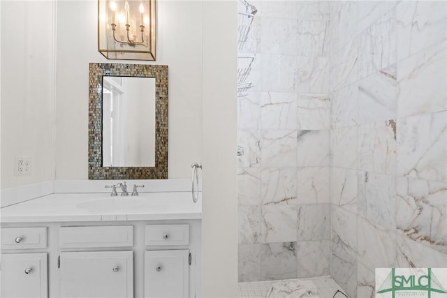 417 Whitaker St, Savannah, GA 31401 - bathroom with vanity, a chandelier, and tiled shower