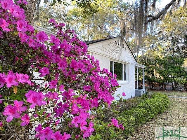 view of home's exterior featuring brick siding