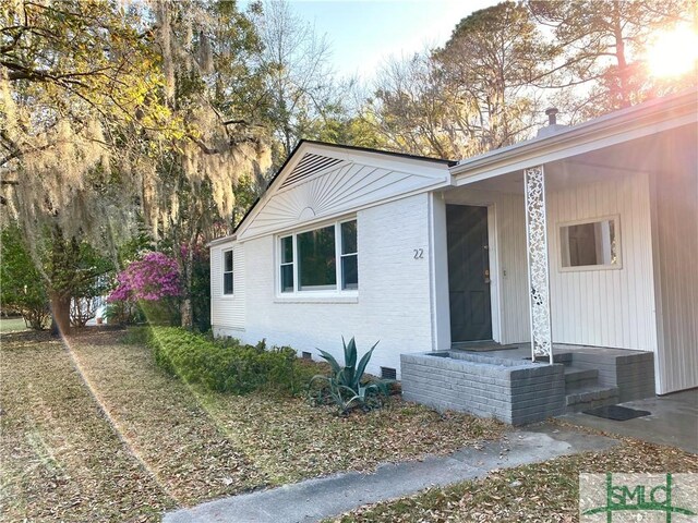 22 Colonel Estill Ave, Savannah, GA 31406 - view of side of property featuring brick siding and crawl space