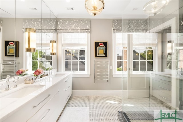 5091/2 Tattnall St, Savannah, GA 31401 - full bathroom featuring visible vents, ornamental molding, a sink, and a healthy amount of sunlight