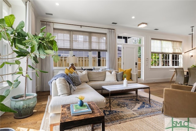 5091/2 Tattnall St, Savannah, GA 31401 - living area with wood finished floors, recessed lighting, baseboards, visible vents, and ornamental molding