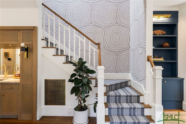 5091/2 Tattnall St, Savannah, GA 31401 - stairway with wood finished floors, built in shelves, wet bar, and visible vents