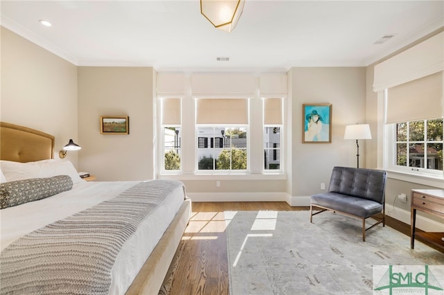 5091/2 Tattnall St, Savannah, GA 31401 - bedroom featuring visible vents, crown molding, baseboards, wood finished floors, and recessed lighting