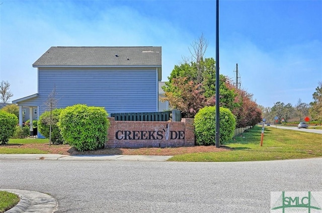 95 Glen Way, Richmond Hill, GA 31324 - community sign with a lawn