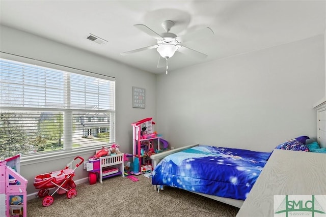 95 Glen Way, Richmond Hill, GA 31324 - carpeted bedroom with a ceiling fan and baseboards