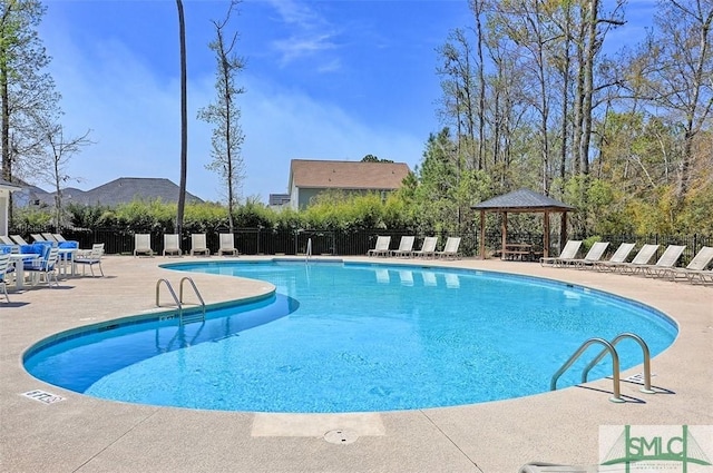 95 Glen Way, Richmond Hill, GA 31324 - community pool with a gazebo, fence, and a patio