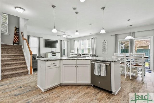 95 Glen Way, Richmond Hill, GA 31324 - kitchen with dishwasher, a sink, open floor plan, ceiling fan, and light wood finished floors