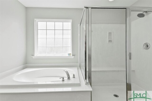 95 Glen Way, Richmond Hill, GA 31324 - bathroom featuring a shower stall and a garden tub