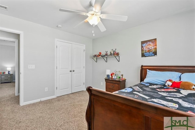95 Glen Way, Richmond Hill, GA 31324 - carpeted bedroom with baseboards, a closet, and a ceiling fan