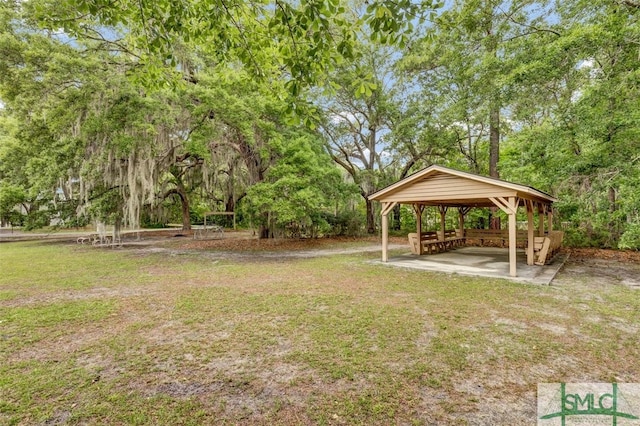 view of yard with a detached carport and a gazebo