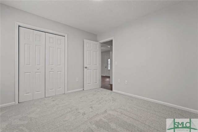 210 Mulberry Way, Rincon, GA 31326 - unfurnished bedroom with carpet flooring, baseboards, and a closet