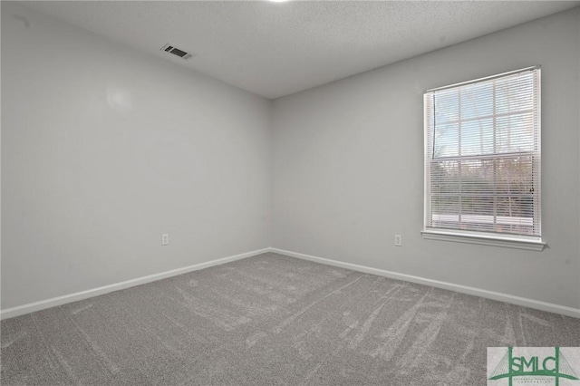 210 Mulberry Way, Rincon, GA 31326 - unfurnished room with carpet, baseboards, and a textured ceiling