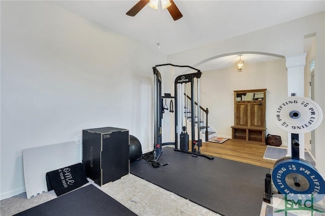 3286 Garden Hills Loop, Richmond Hill, GA 31324 - workout room featuring arched walkways, a ceiling fan, and decorative columns