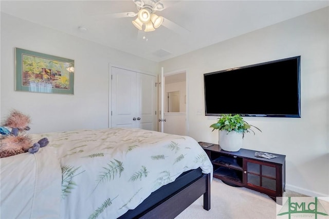 3286 Garden Hills Loop, Richmond Hill, GA 31324 - bedroom with baseboards, carpet flooring, a closet, and ceiling fan