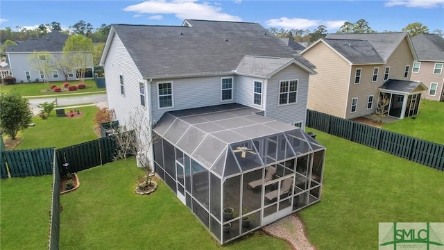 3286 Garden Hills Loop, Richmond Hill, GA 31324 - rear view of house featuring a lawn, a fenced backyard, and a patio area
