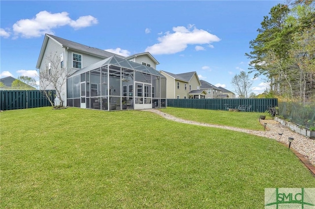 3286 Garden Hills Loop, Richmond Hill, GA 31324 - back of property featuring a lanai, a fenced backyard, and a yard