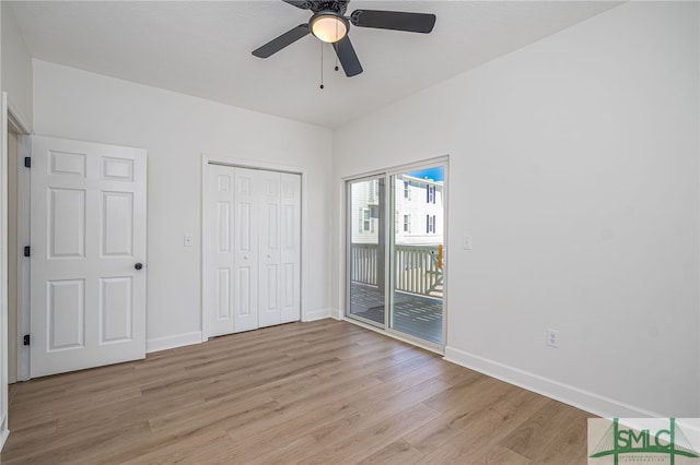 unfurnished bedroom featuring light wood-style flooring, access to exterior, ceiling fan, and baseboards