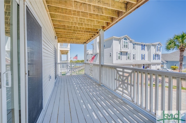 wooden deck with a residential view