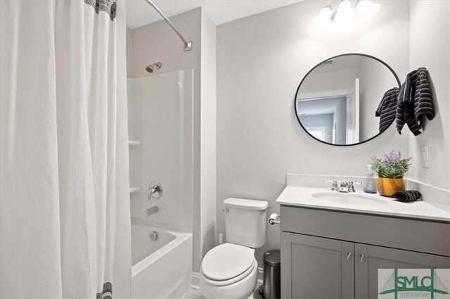 82 Rimmon Ct, Richmond Hill, GA 31324 - bathroom featuring toilet, vanity, and shower / bathtub combination with curtain